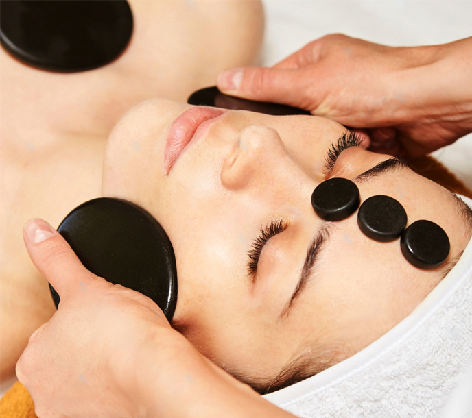 A woman getting a thai facial